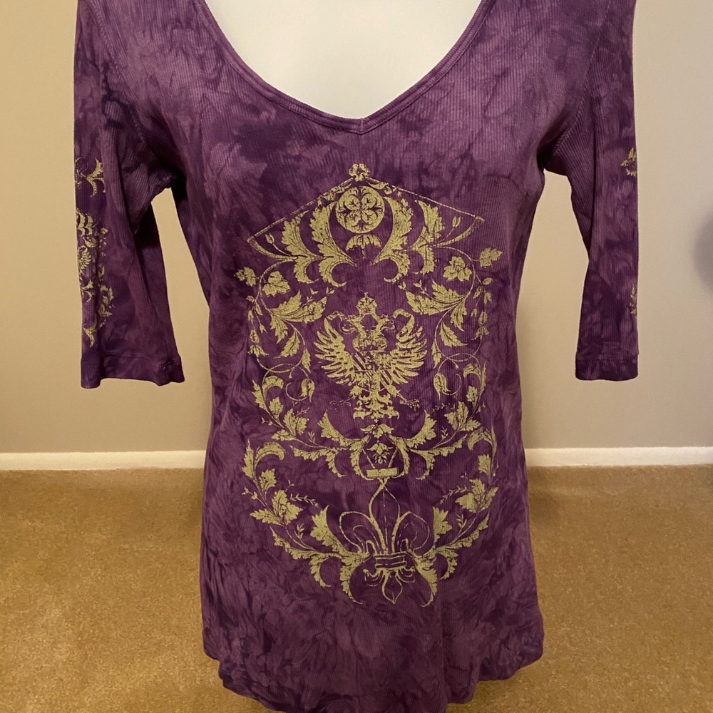 Size large.   Ribbed cotton stretches
